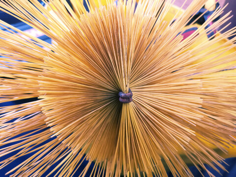 Close up of bristles of yellow nylon chimney sweep brush