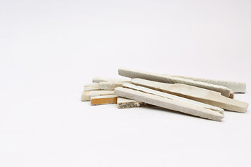 white slate chak on white background with copy space.