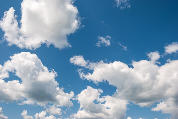 Heap, white clouds in the blue sky. Sky landscape