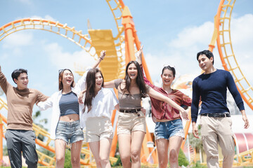 Lifestyle group of friend enjoying at amusments park in vacations
