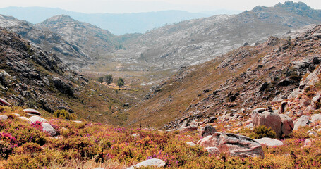 The rocky landscape and mountainous relief of Portuguese-Spanish border forest in Peneda Geres,...
