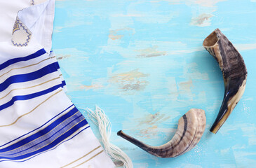 religion image of shofar (horn) on white prayer talit. Rosh hashanah (jewish New Year holiday),...
