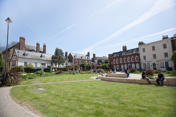 Views of Gloucester Cathedral Gardens and surrounding buildings in Gloucester in the UK - obrazy, fototapety, plakaty