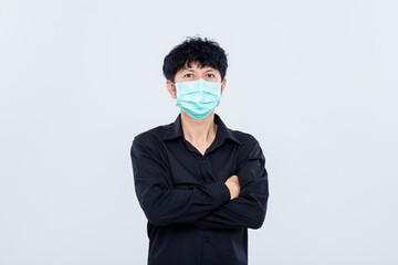 Asian men wear masks to prevent PM.5 dust and The coronavirus epidemic is spreading isolated white background.