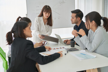 Businesspeople meeting for sale seminar in office