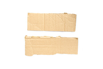 Recycled paper craft stick on a white background. Brown paper torn or ripped pieces of paper isolated on white background.