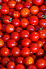 Ripe tomatoes of the new harvest are sold in the bazaar 