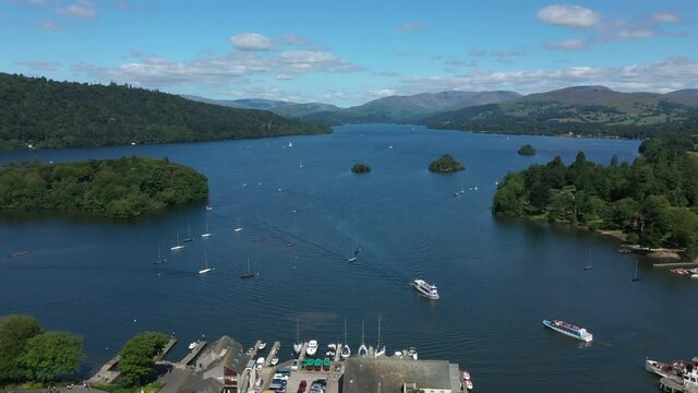 4K:  Drone Aerial Clip of Lake Windermere in the English Lake District, Cumbria, UK. Approach shot in Summer with Blue Sky. Stock Video Clip Footage