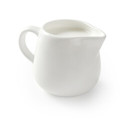 Ceramic milk jar isolated on white background. Milk pitcher for package design. Porcelain creamer pitcher with milk on white. - obrazy, fototapety, plakaty