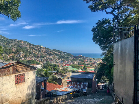 A View of Downtown Cap-Haitien, Haiti and the Sea from a Street in the Hills Above