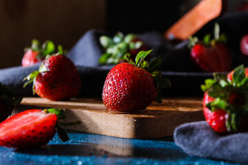 fresh ripe strawberries on wooden board