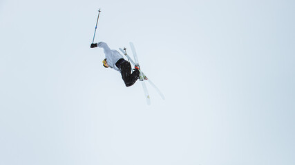 Skiier doing a trick