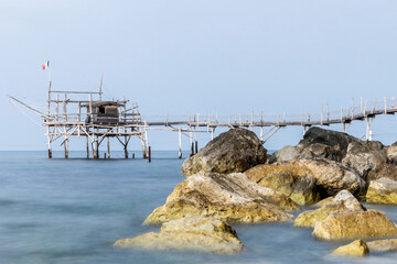 Fototapeta na wymiar June 2021, San Vito Chietino, Abruzzo, Italy. Trabocchi coast. View of the Turchino Trabocco. Ancient fishing machine