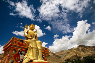 Buddha statue on the roof of a monastery Ladakh India