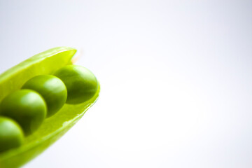 Very close image of fresh pea in pod