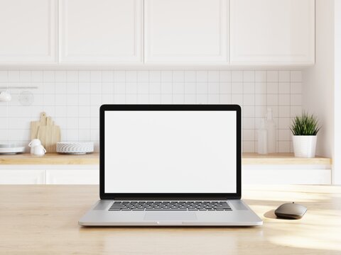 Laptop mockup on wooden top in a white cozy kitchen. 3d illustration.