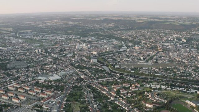 Drone Aerial shot of the frenc city Montluçon in central France at sunset. Montlucon is a large town in the Allier department and belongs to the Auvergne-Rhône-Alpes region.
