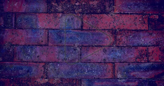 Animation of neon play icon over brick wall background