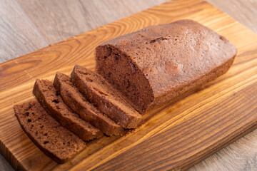 Sliced homemade chocolate  pound cake loaf. food concept