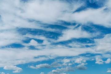 blue sky with fluffy white clouds