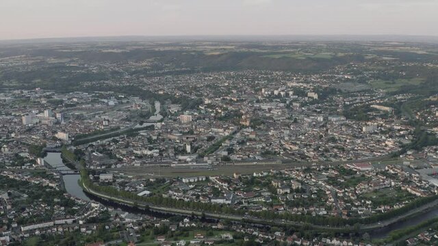 Drone Aerial shot of the frenc city Montluçon in central France at sunset. Montlucon is a large town in the Allier department and belongs to the Auvergne-Rhône-Alpes region.