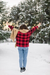 Fototapeta na wymiar Happy Girl In Red Jachet The Snow Forest. Cold Winter. Cup of tea.