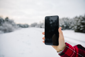 Happy Girl In Red Jachet The Snow Forest. Cold Winter. Cup of tea.