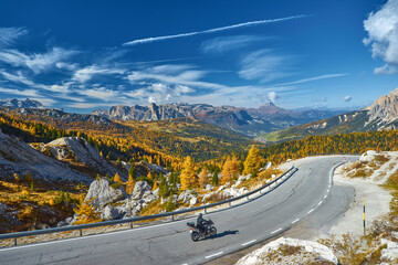 Autumn morning alpine Dolomites mountain scene. Peaceful Valparola Path view, Belluno, Italy.