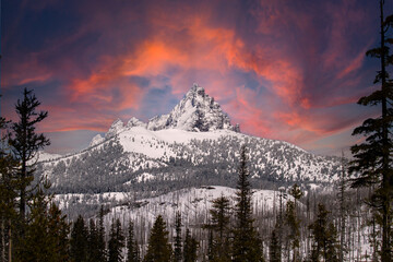 The snow covered mountain Three Fingered Jack at sunset in the cascade range of central Oregon, in...