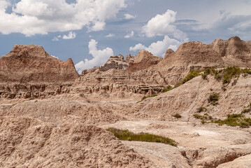 Badlands National Park, SD, USA - June 1, 2008: Desert like desolate and dry scenery of brown...