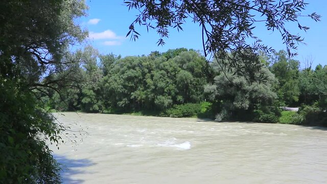 Ismaning, Bavaria, Germany - High water of  the Isar river from the B 471 bridge few Kilometers from Munich. The river banks are submerged.