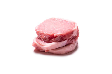 Raw pork pieces isolated on a white background.
