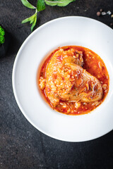 pepper rice stuffed tomato sauce vegetable fresh in plate vegetables on the table meal snack copy space food background rustic keto or paleo diet veggie vegan or vegetarian food