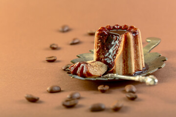 Coffee panna cotta with chocolate sauce.