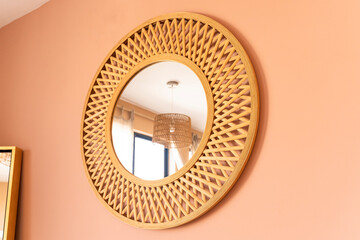 Wall mount round decorative wall wooden mirror, whit living room reflections, modern bamboo design Scandinavian home decor angle view