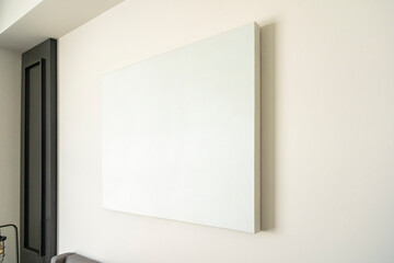 Empty canvas, poster, blank frame canvas, mock up, on a white wall, living room, home decoration...