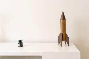 Interior kids bedroom design, wooden rocket, vintage skyrocket toy, residence nursery decor, old...