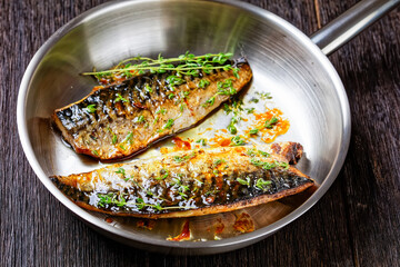 fried mackerel fillets with spices and herbs