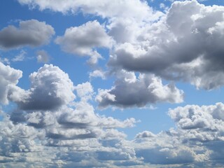 The sky is blue, white clouds