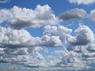 The sky is blue, white clouds