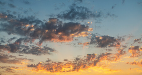 
Beautiful sky with colorful bright clouds after sunset. Sky nature background.