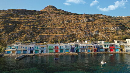 Fototapeta na wymiar Aerial drone photo of picturesque seaside village of Klima and traditional fishermen settlement with colourful boat garages called syrmata in island of Milos, Cyclades, Greece