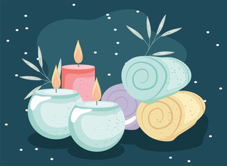 spa towels and candles
