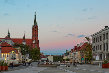 Fototapeta na wymiar Church on the square in Europe