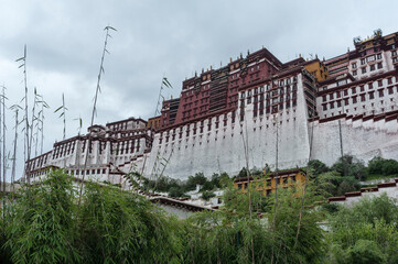 LHASA, TIBET - AUGUST 17, 2018: Magnificent Potala Palace in Lhasa, home of the Dalai Lama before the Chinese invasion and Unesco World Heritage Site. 