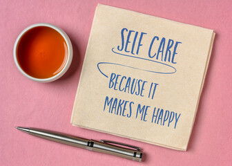self care, because it makes me happy -  inspirational reminder,  handwriting on a napkin, lifestyle and health concept