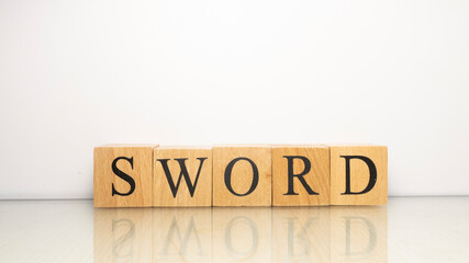 The name Sword was created from wooden letter cubes. war and history.