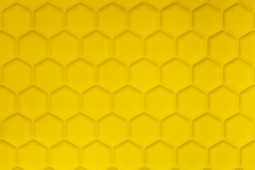 Bright yellow cellular structure background. Yellow honeycomb background.