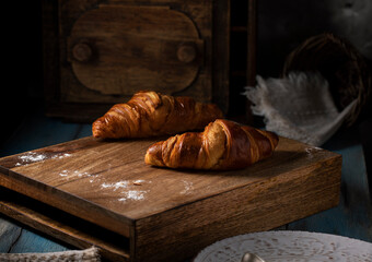 Fresh croissants on the morning table