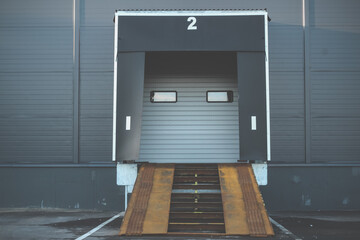 Industrial loading dock and ramp for a large warehouse. gate for loading cargo